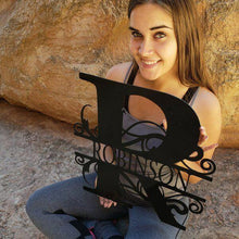 Load image into Gallery viewer, A photograph of a Black / 18&quot; x 18&quot; / Indoor Split-letter Monogram by the metal art manufacturer Kraken Design Co.