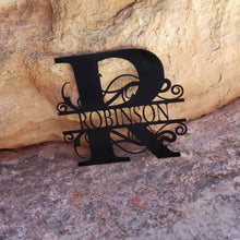 Load image into Gallery viewer, A photograph of a Black / 18&quot; x 18&quot; / Outdoor Split-letter Monogram by the metal art manufacturer Kraken Design Co.
