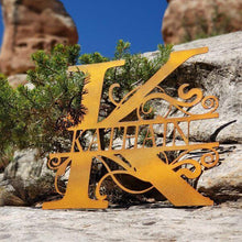 Load image into Gallery viewer, A photograph of a Bronze / 18&quot; x 18&quot; / Outdoor Split-letter Monogram by the metal art manufacturer Kraken Design Co.