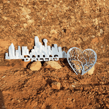 Load image into Gallery viewer, A photograph of a Dallas Skyline by the metal art manufacturer Kraken Design Co.