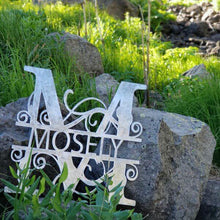 Load image into Gallery viewer, A photograph of a Shiny Steel / 18&quot; x 18&quot; / Indoor Split-letter Monogram by the metal art manufacturer Kraken Design Co.