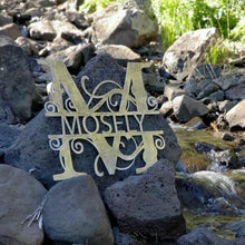 Load image into Gallery viewer, A photograph of a Shiny Steel / 18&quot; x 18&quot; / Outdoor Split-letter Monogram by the metal art manufacturer Kraken Design Co.