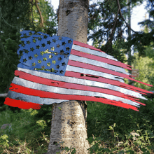 Load image into Gallery viewer, A photograph of a Tattered US Flag by the metal art manufacturer Kraken Design Co.