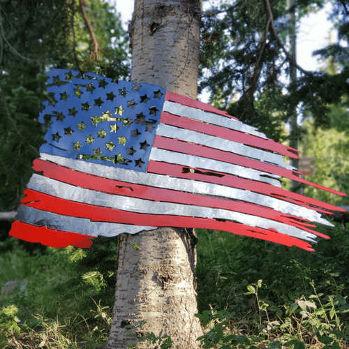 A photograph of a Tattered US Flag by the metal art manufacturer Kraken Design Co.