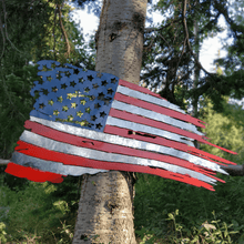 Load image into Gallery viewer, A photograph of a Tattered US Flag by the metal art manufacturer Kraken Design Co.